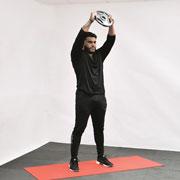 Weight Plate High Front Raise Demonstration