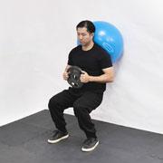 Stability Ball Weighted Wall Squat Demonstration