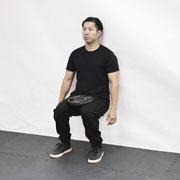 Weight Plate Wall Sit Demonstration