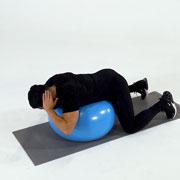 Stability Ball Back Extension with Hands Behind Head Demonstration