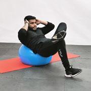 Stability Ball Cross-Leg Crunch Demonstration