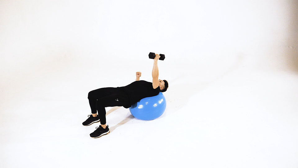 Dumbbell One-Arm Fly on Stability Ball