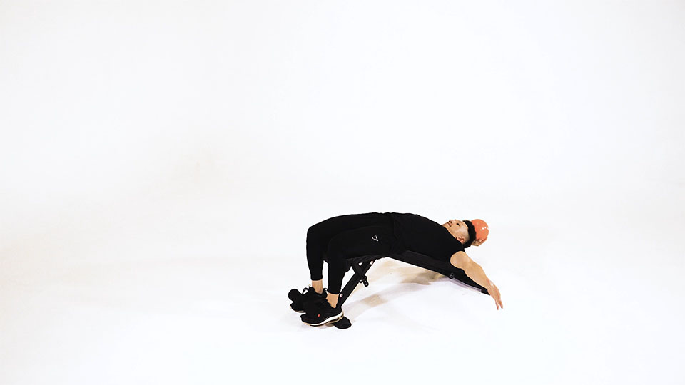 Medicine Ball Decline One-Arm Overhead Throw - JEFIT