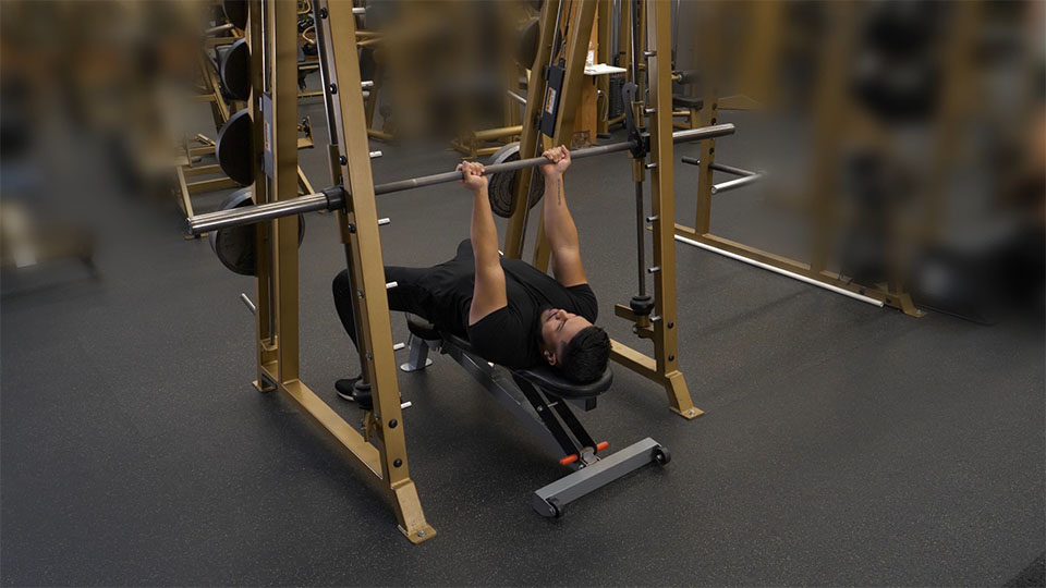 Smith Machine Bench Press (Reverse Grip) exercise