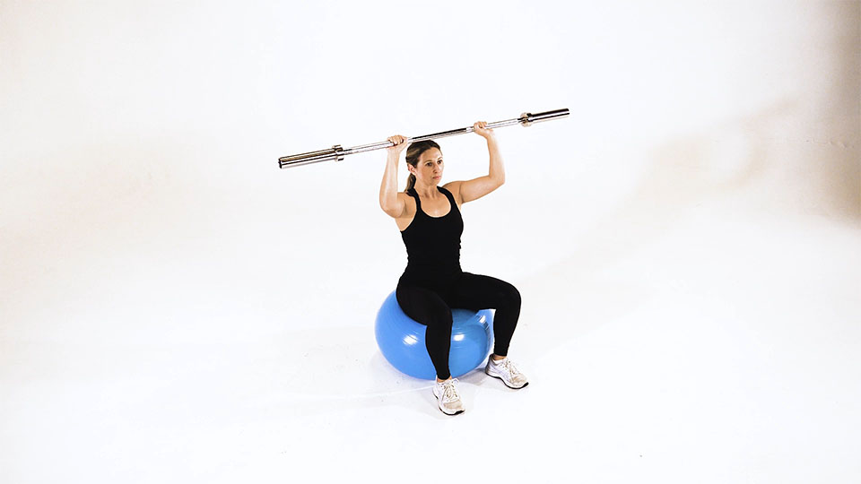 Barbell Press on Stability Ball