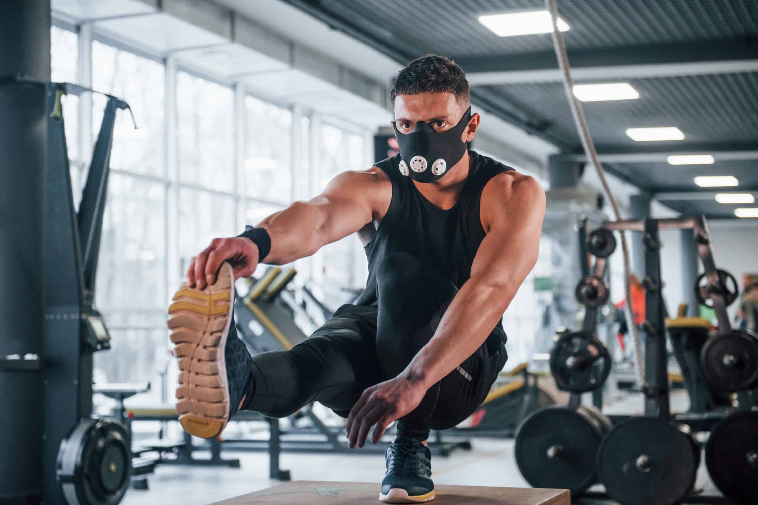 man wearing max working out at the gym