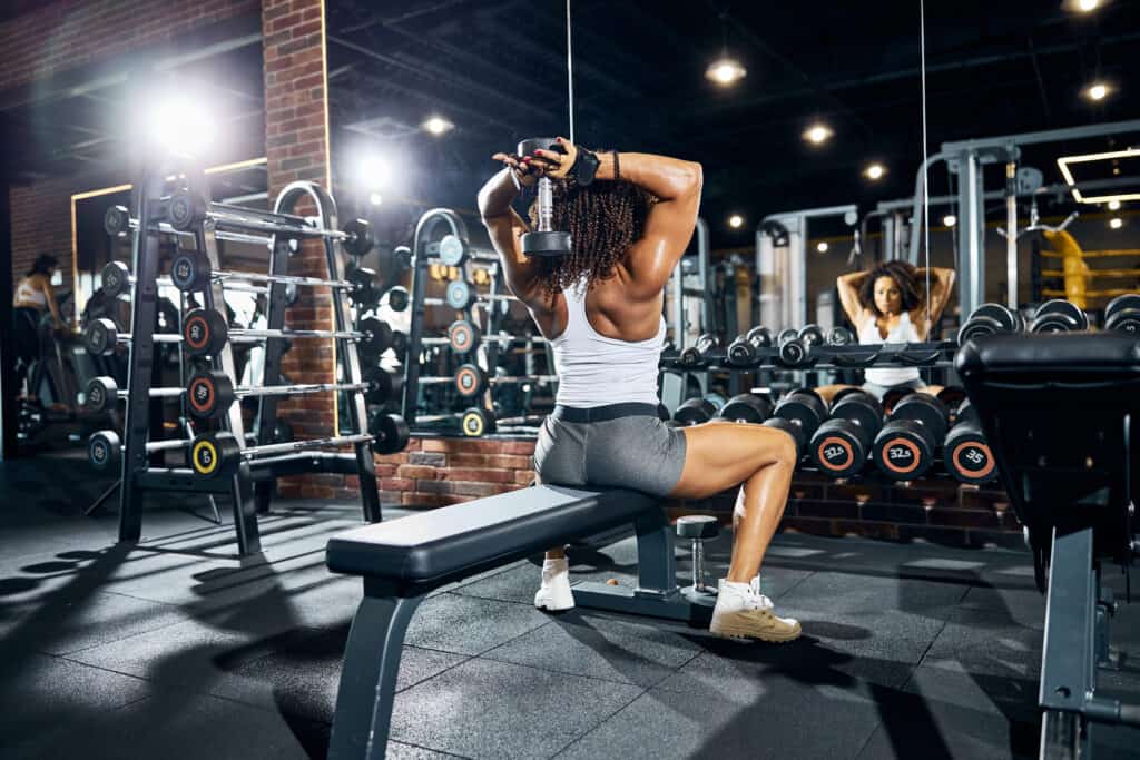 woman performing tricep extension