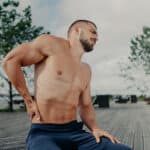 man experiencing back pain