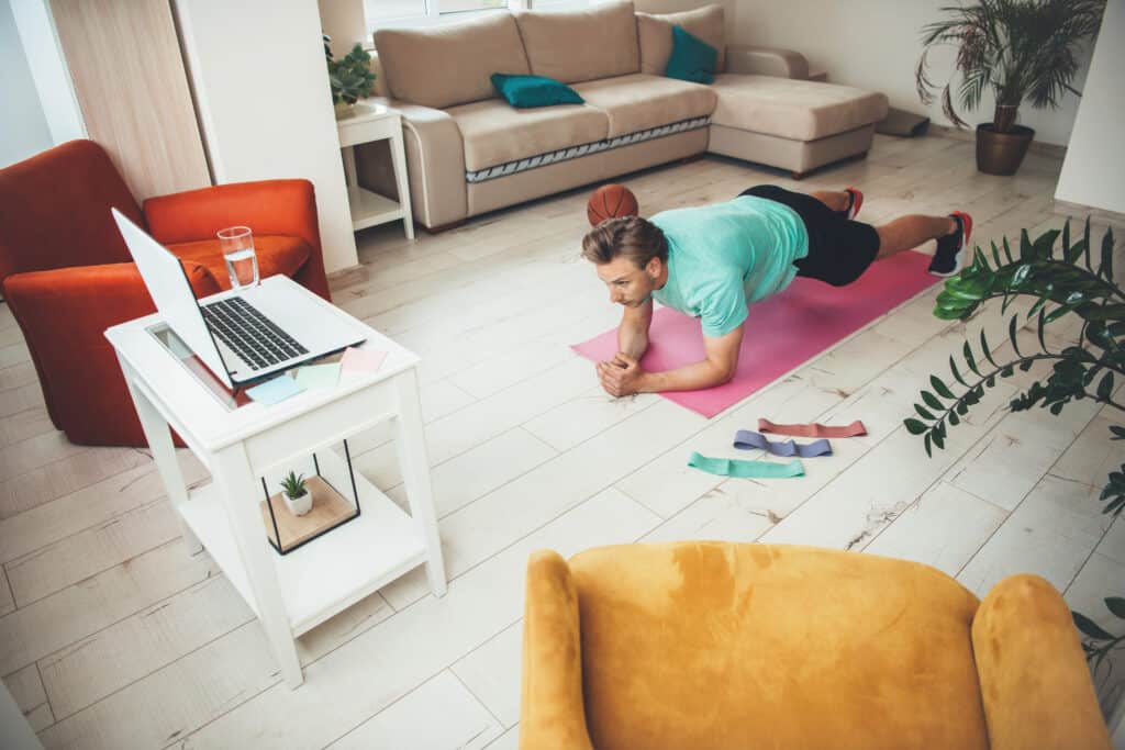 man doing a home workout