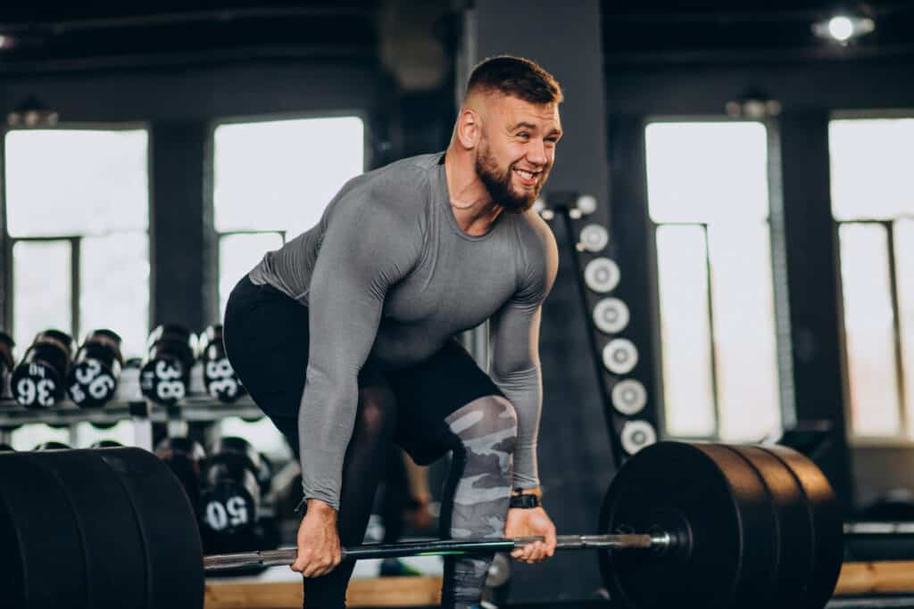 man performing deadlift