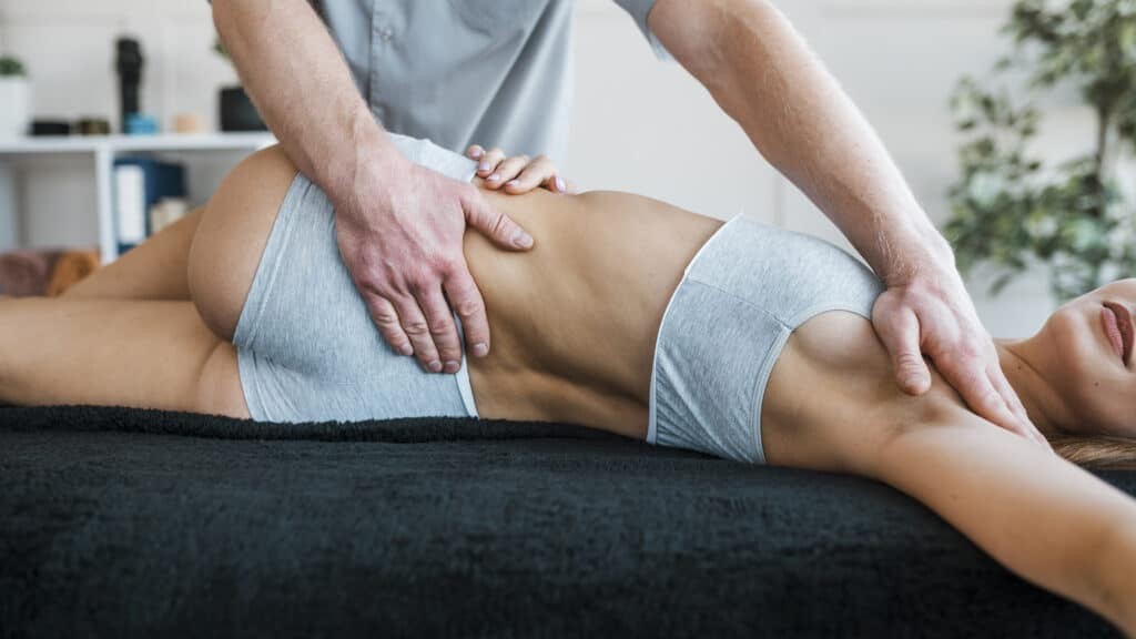 woman getting massage to manage pain
