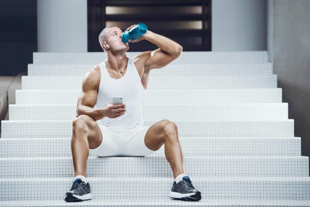 man drinking protein shake