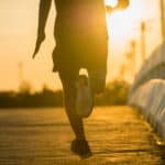man running during sunrise
