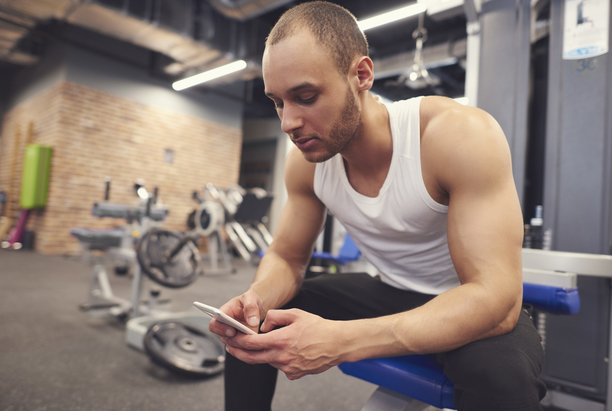 man preparing to work out at the gym