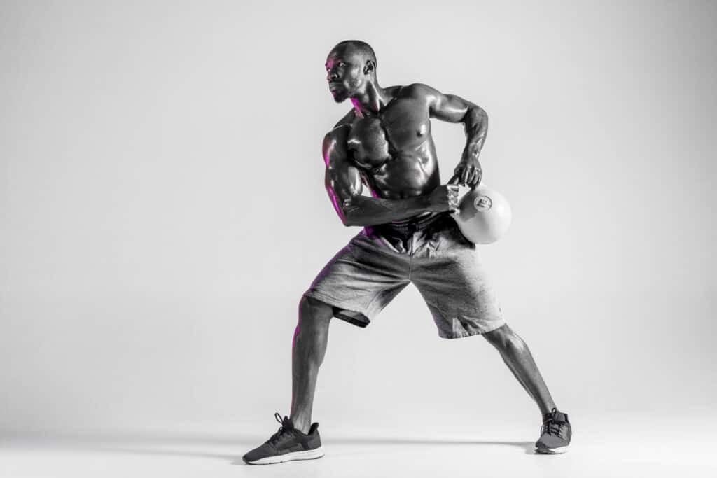 man working out with medicine ball