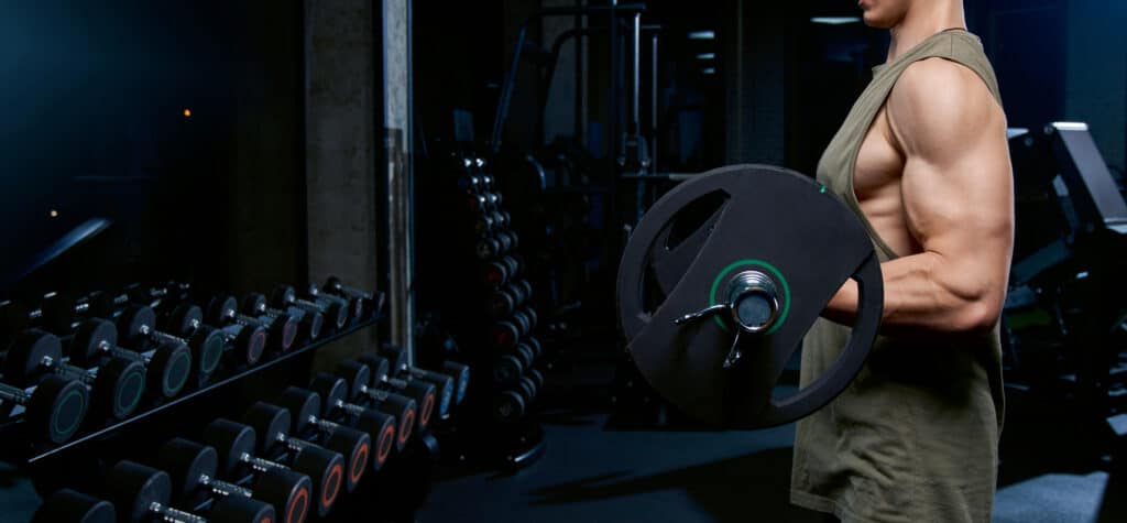 man doing barbell curls