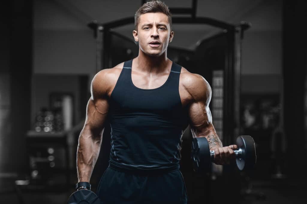 man doing dumbbell curls