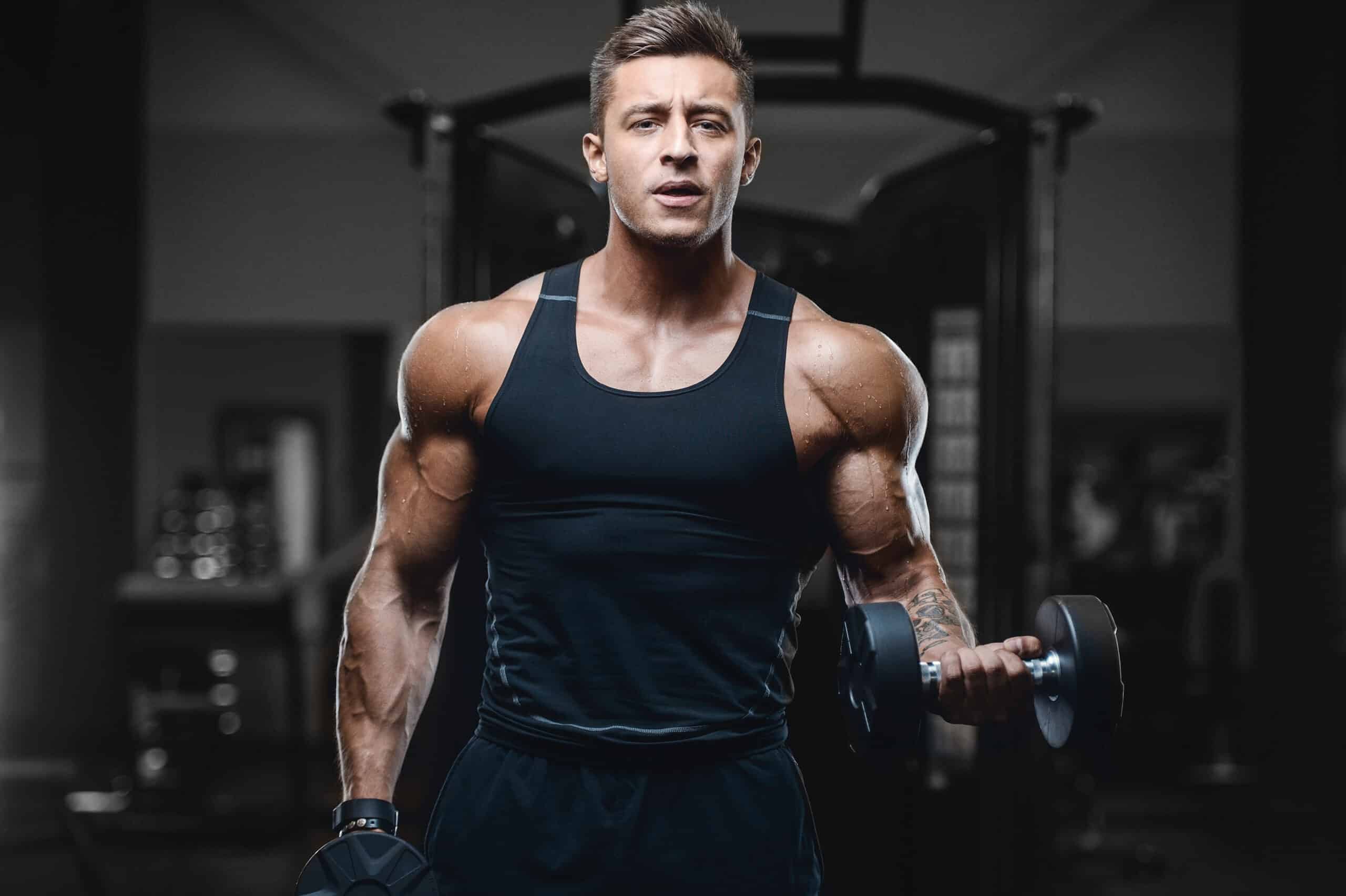 man doing dumbbell curls