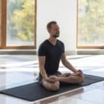 man doing yoga