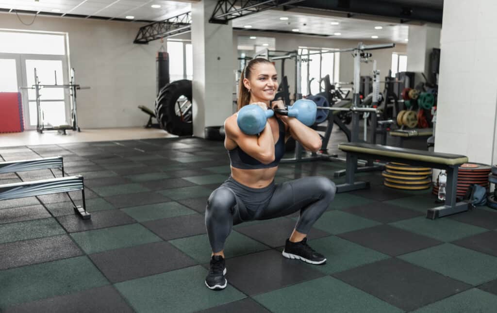 woman doing kettlebell workout