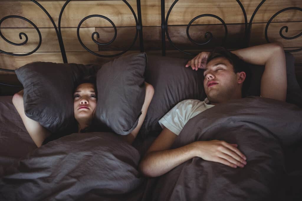 couple trying to sleep