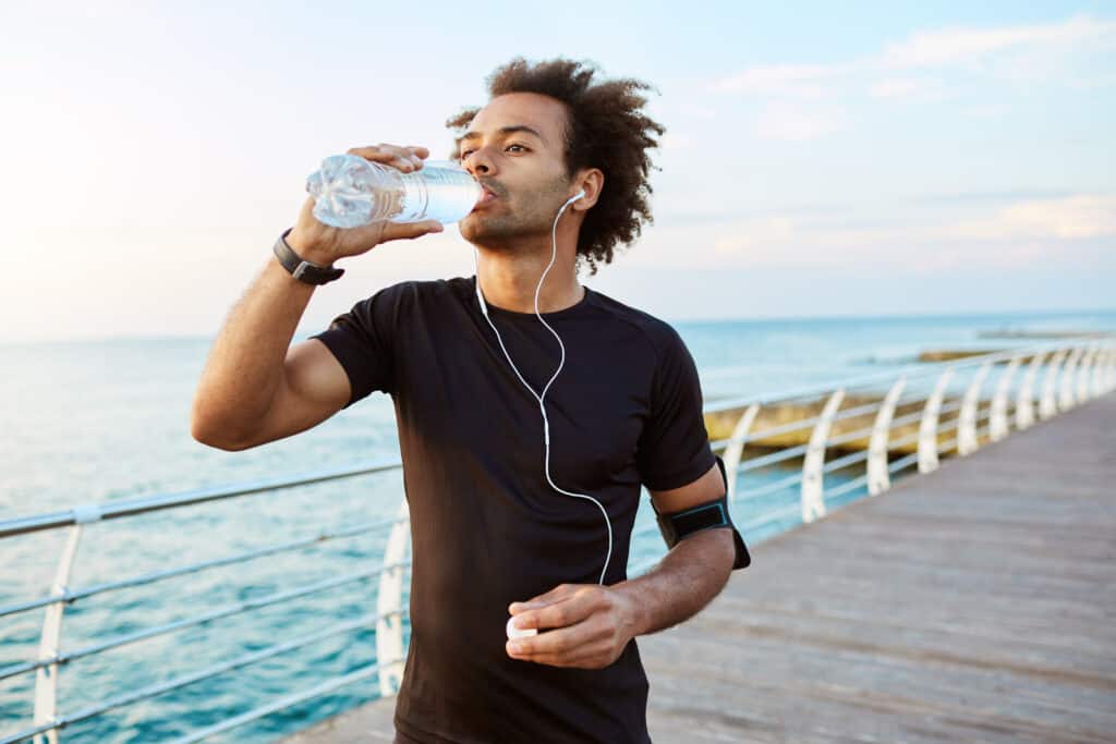 man drinking water