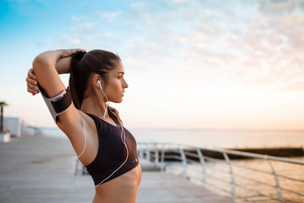 woman stretching her arms