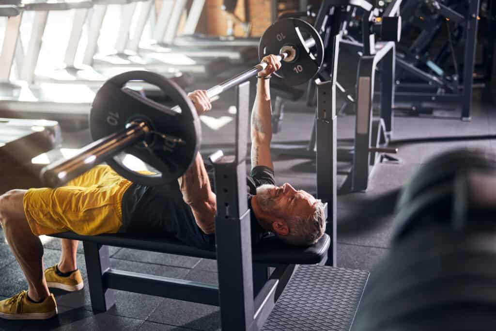 bodybuilder prepping for bench press