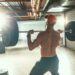 man lifting barbell