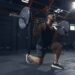 man doing barbell lunge