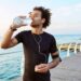 man drinking water