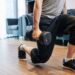 man doing dumbbell lunge